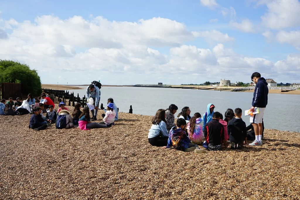 Picture of group on beach learning